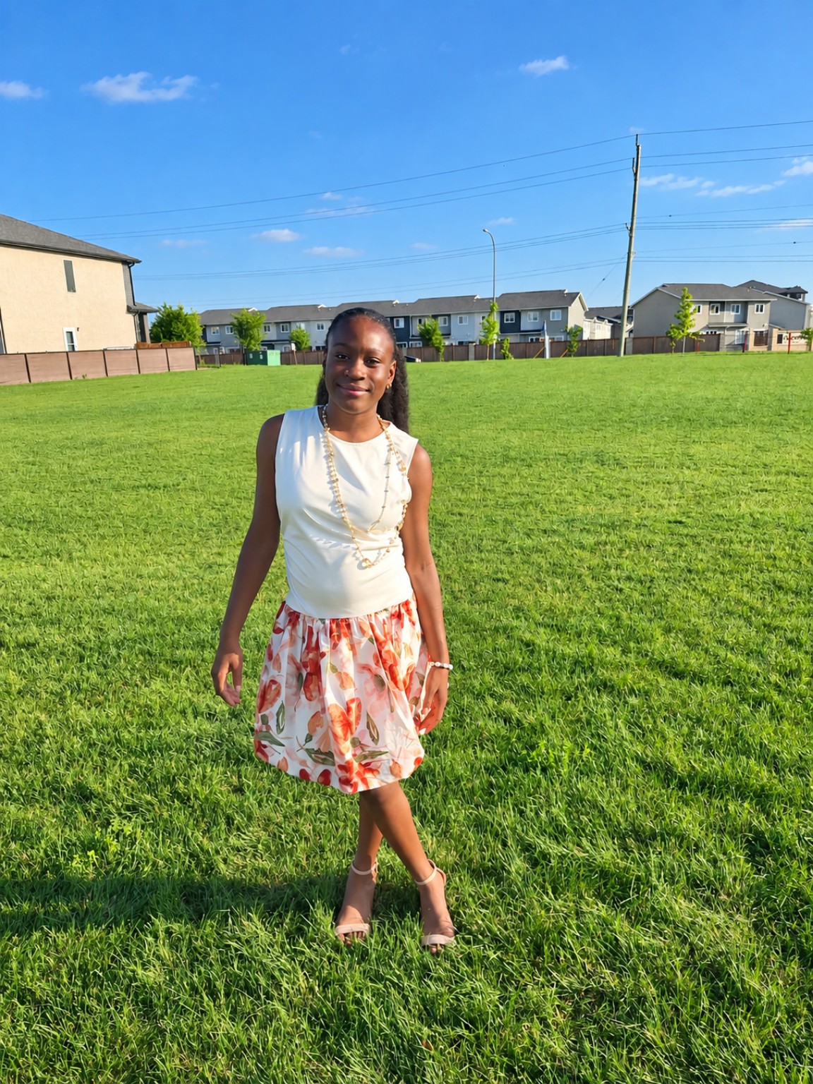 Praise standing in a green field